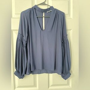 LUSH brand size small navy blouse.